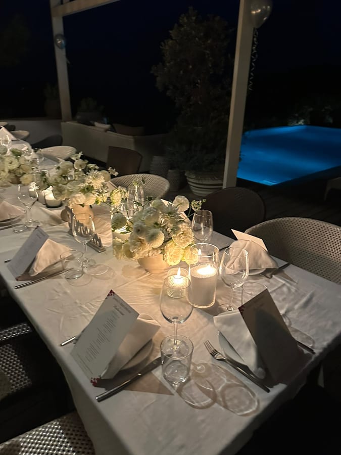 Candlelight, white flowers, the pool